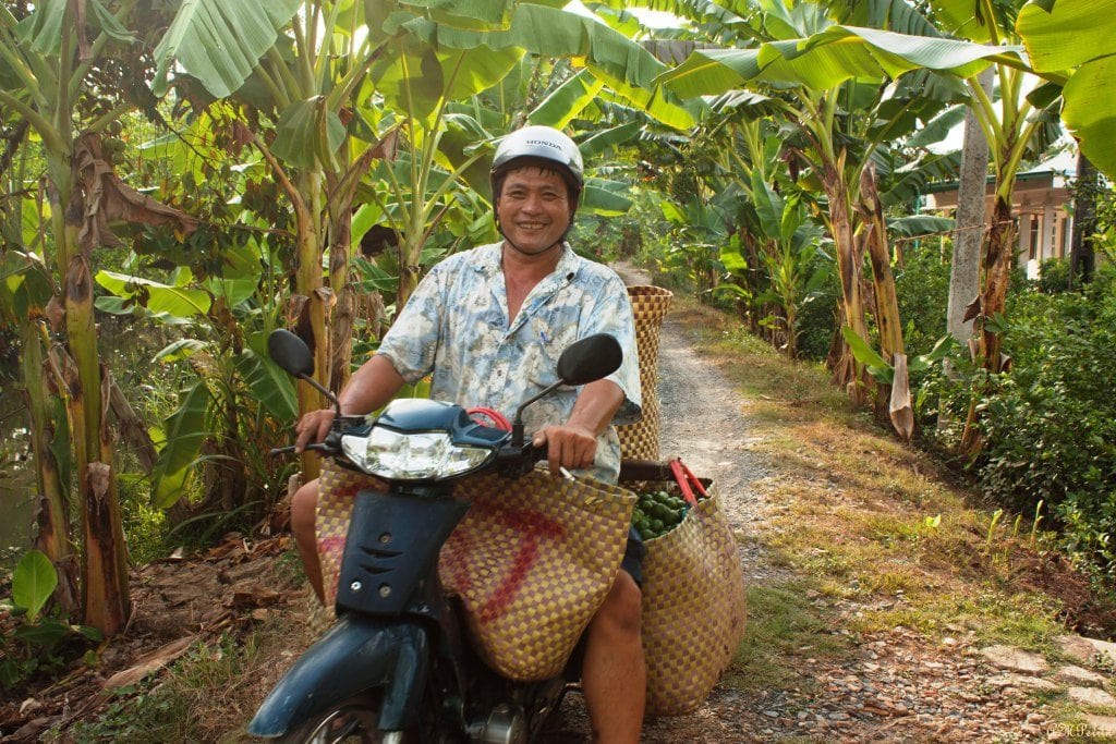 Agriculeteur de bannier au Delta du Mekong